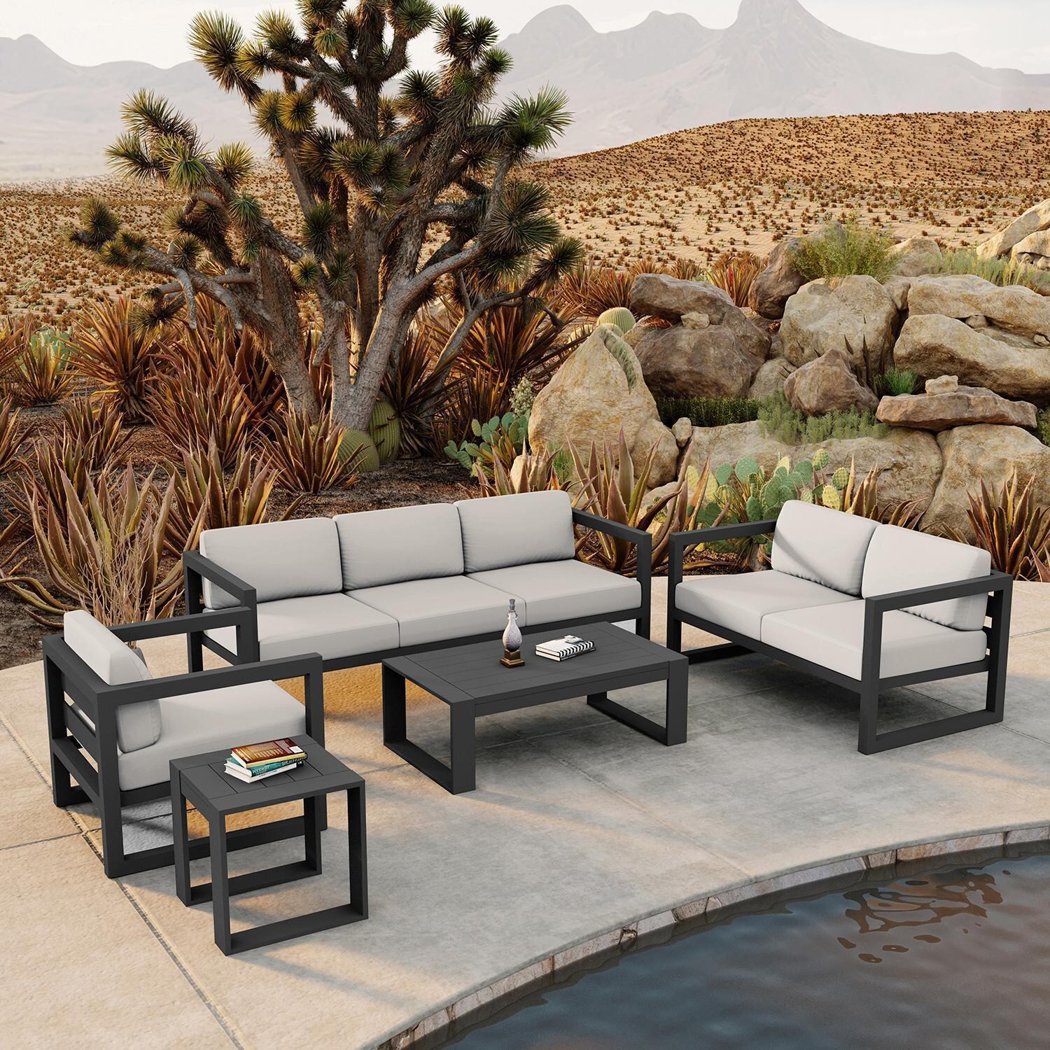Misty Cove 5 Piece Seating Set in Slate w/Portal Coffee Table & Canvas Natural Cushions by Lakeview - Lifestyle thumbnail