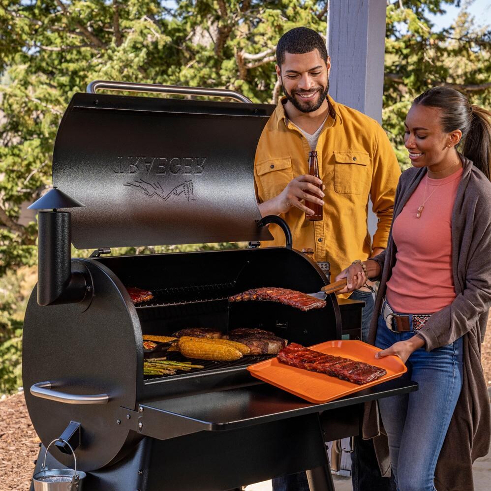 Traeger TFB57GLE Pro 780 Black Wood Pellet Grill - Open Hood - Lifestyle thumbnail