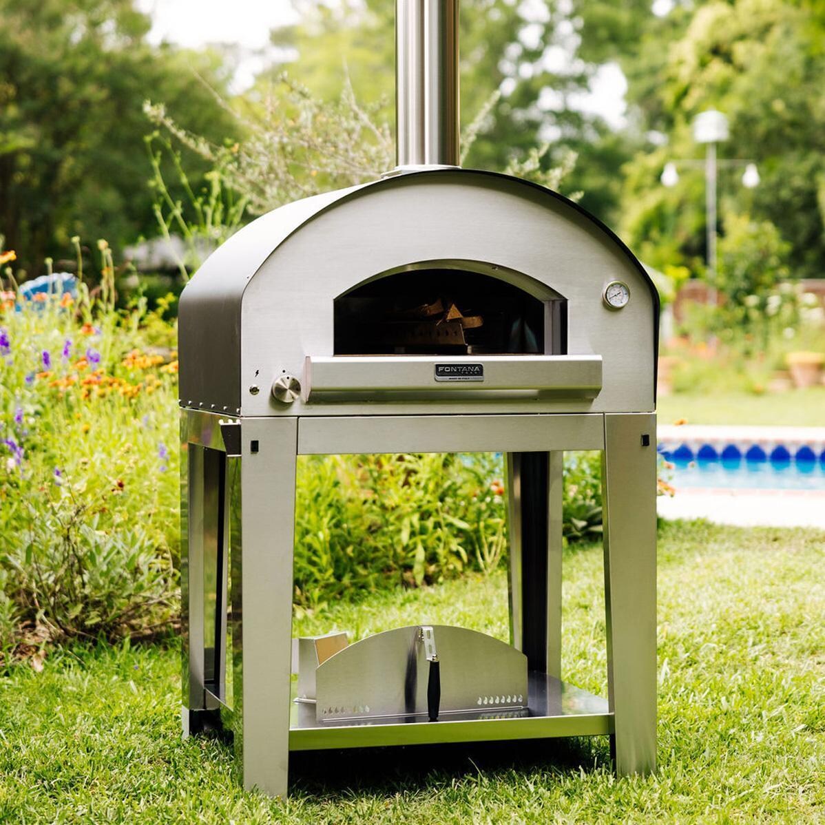 Fontana Forni FTFIR-H-R + FTCART-L Firenze Hybrid Pizza Oven on Cart - Red - In the Yard W/ No Door - Lifestyle thumbnail