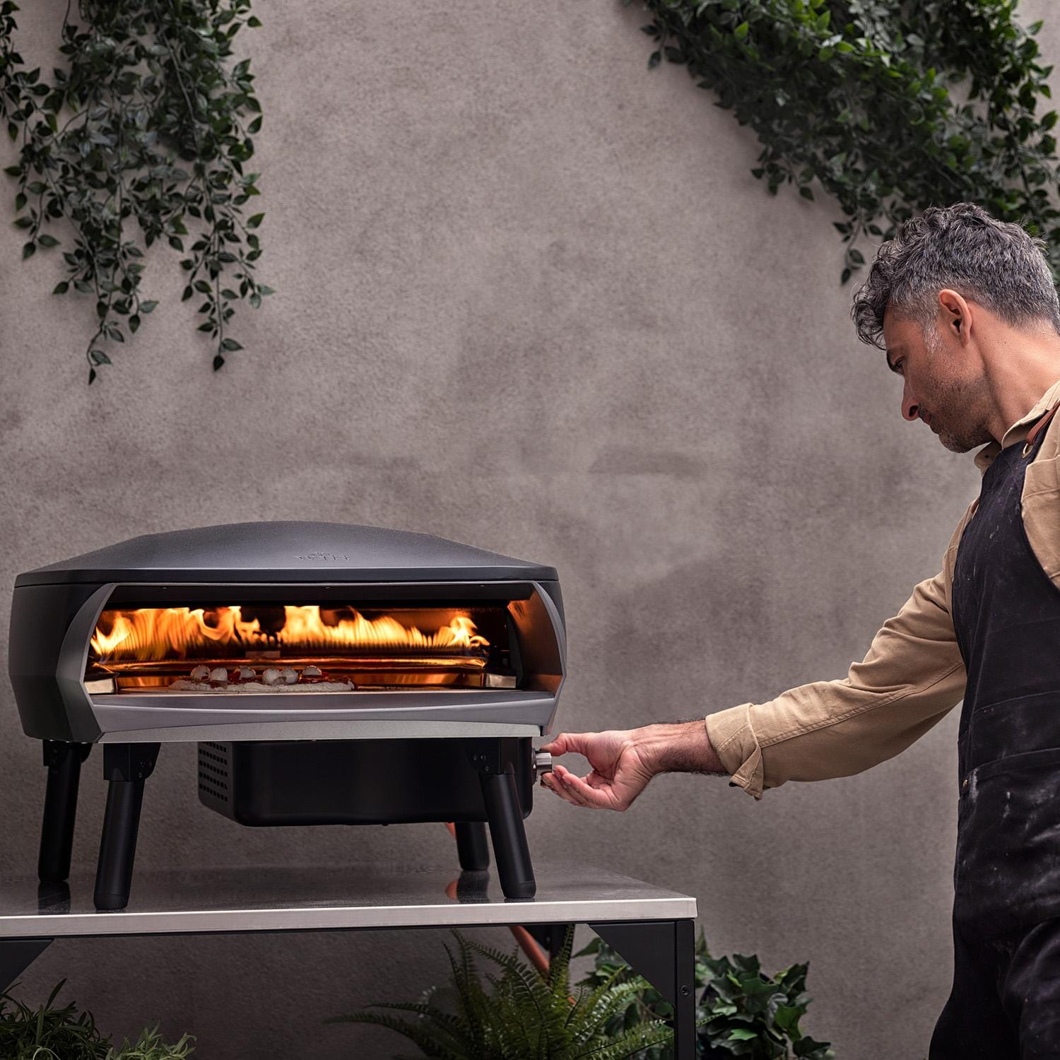 Witt 80650064 Etna Rotante Propane Pizza Oven - Matte Graphite - Baking Pizza (Shown in Matte Black) - Lifestyle thumbnail
