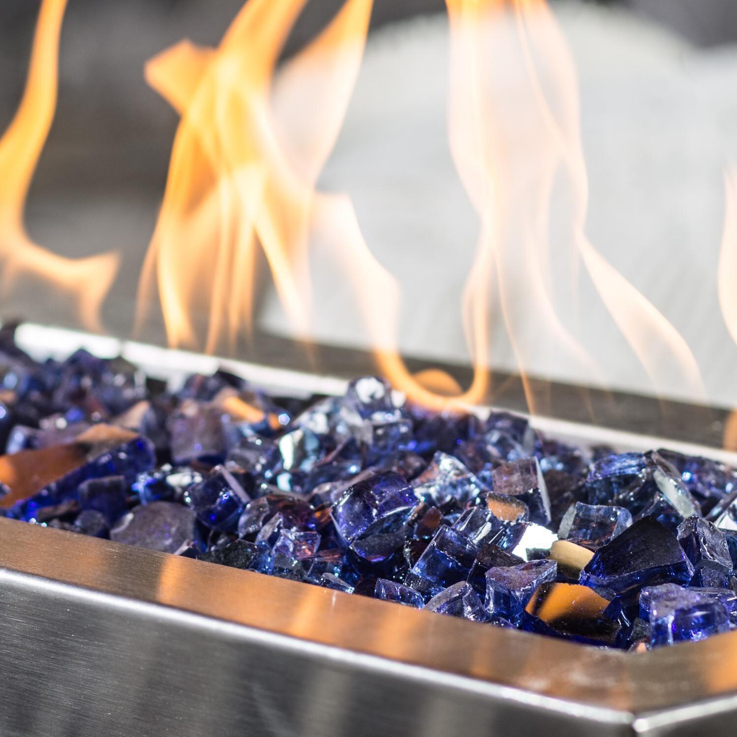 BBQGuys Signature Series Westfalen 18-Inch Table-Top Propane Fire Pit - Stainless Steel - Close Up - Shown with 1/2 inch Blue Jay Reflective Fire Glass (Sold Separately) thumbnail