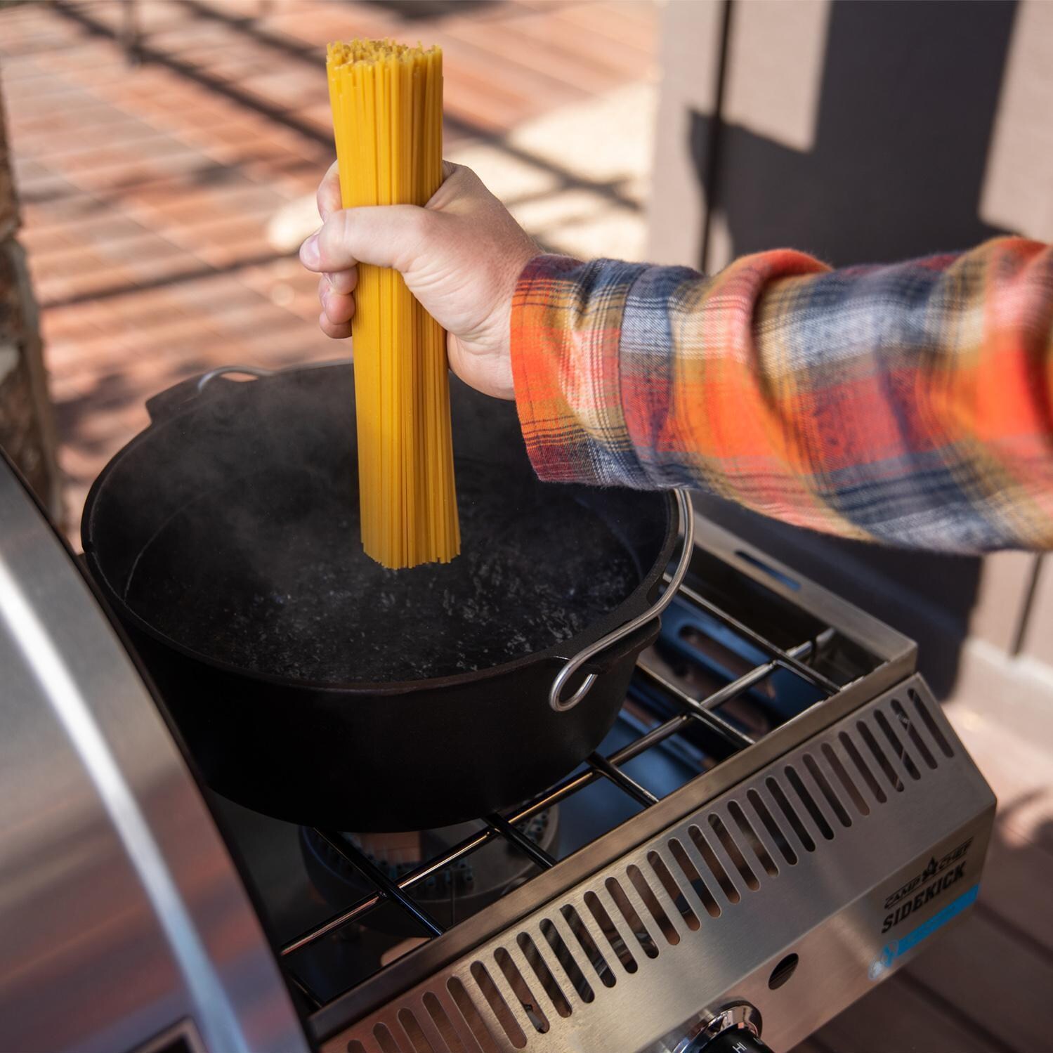 Camp Chef 14-Inch Sidekick Pellet Grill Side Burner w/ Griddle - Cooking Pasta thumbnail