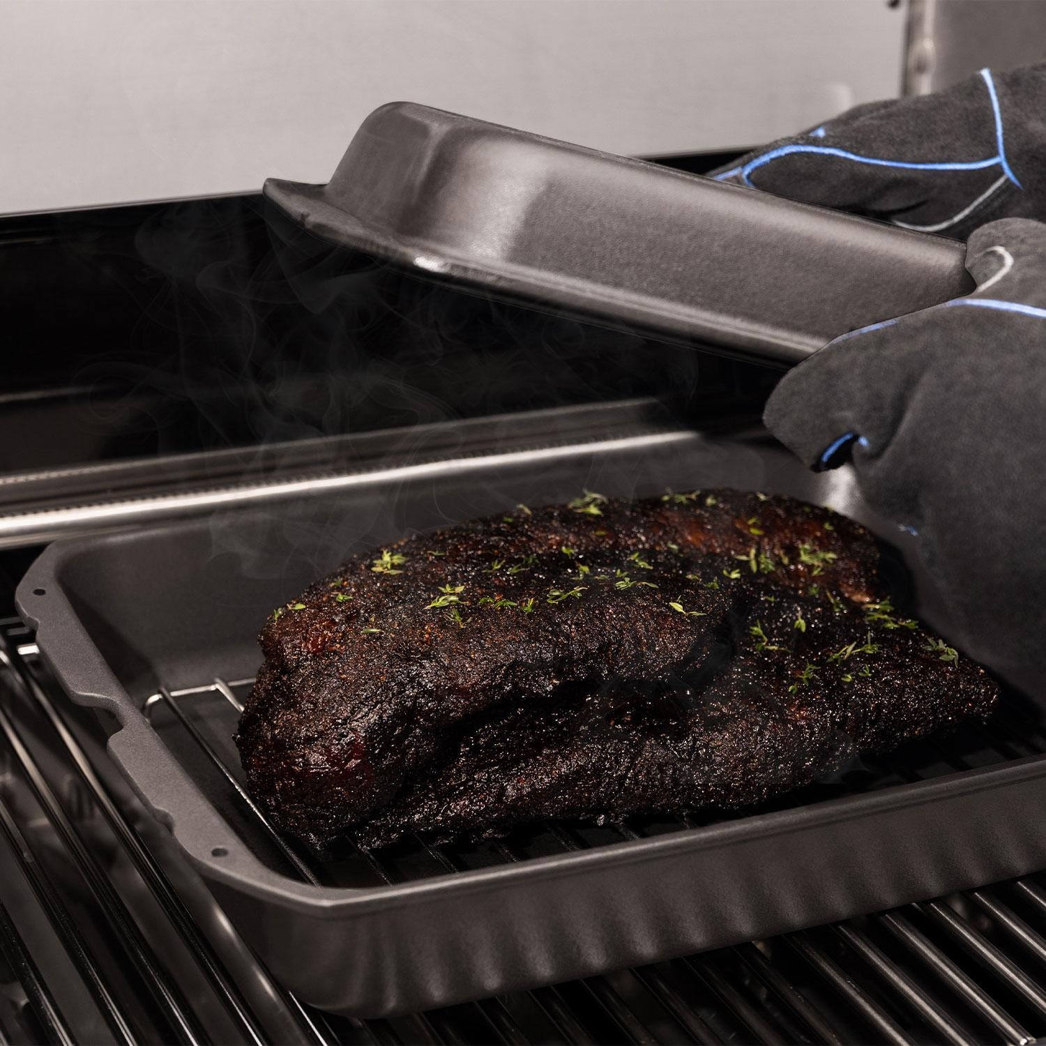 Broil King 69610 Cast Iron Multi Roaster - Uncovering Cooked Roast - Lifestyle thumbnail