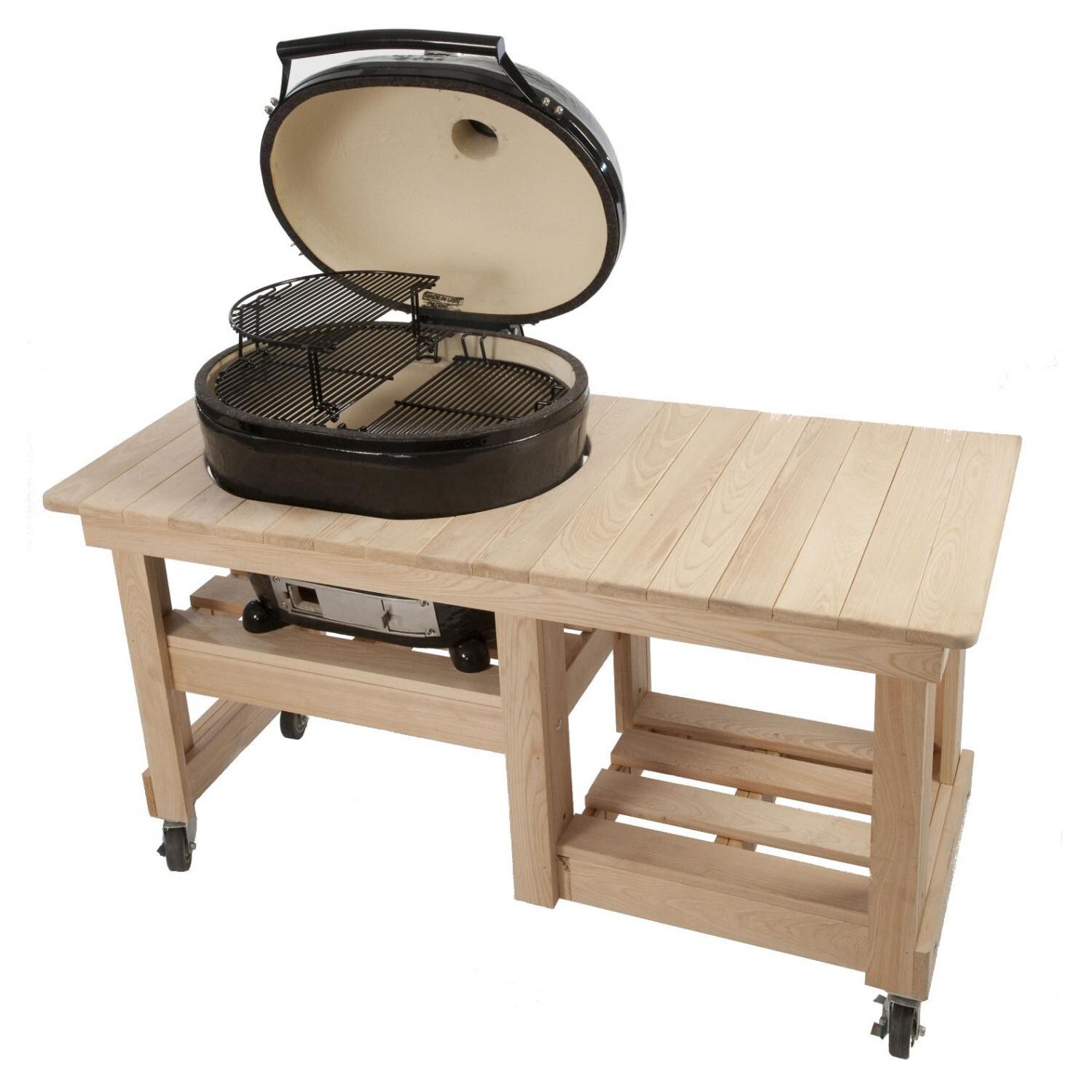 Primo Oval XL Ceramic Charcoal Smoker Grill On Countertop Cypress Table - Angled View With Optional Extended Cooking Rack thumbnail