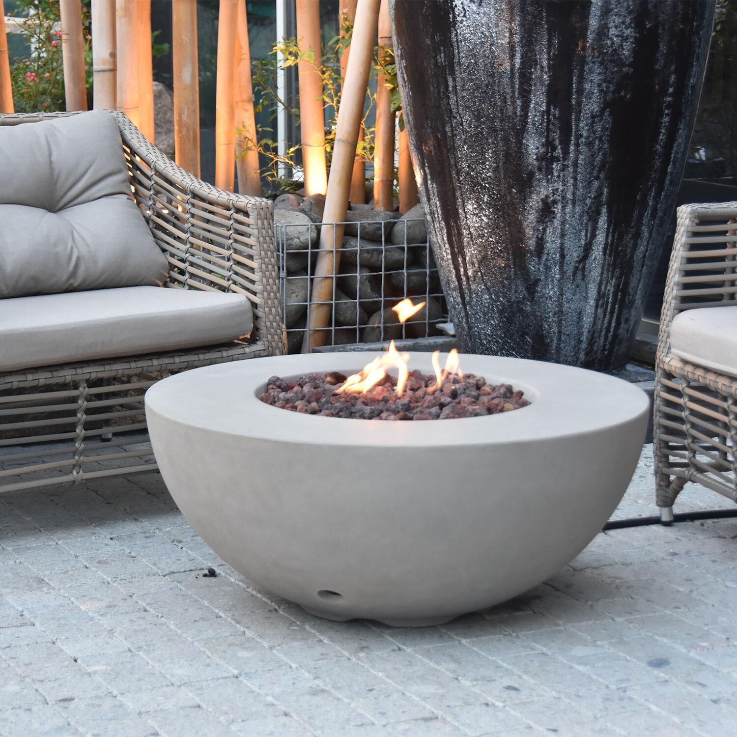 Roca OFG107-NG 34 Inch Round Concrete Natural Gas Fire Pit Table in Gray By Elementi - Back Patio - Lifestyle thumbnail