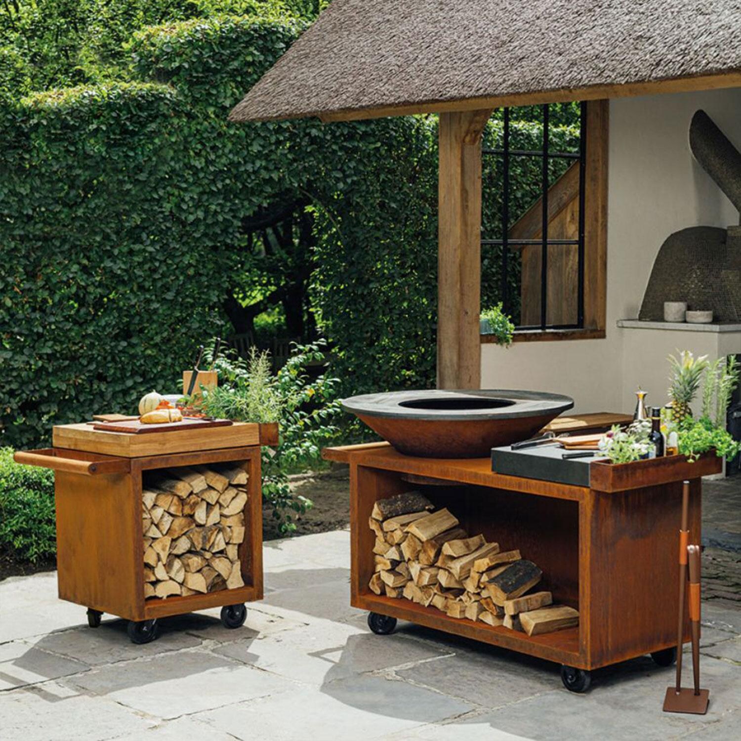 OFYR OI-100-PRO-CD Island Corten 100 PRO Ceramic Dark Grey 70 Inch Wood-Fired Grill Center - Back Patio - Styled w/ Food Prep Station (Not Included, Sold Separately) - Lifestyle thumbnail