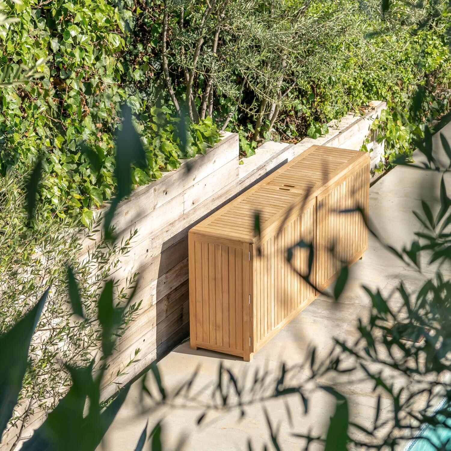 Teak + Table Relax Champagne Table - Side View in Garden - Lifestyle thumbnail