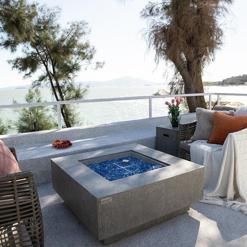 Victoria OFG413LG-LP 40 Inch Square Concrete Propane Fire Pit Table in Gray By Elementi - Off - Back Patio - Side View - Lifestyle thumbnail