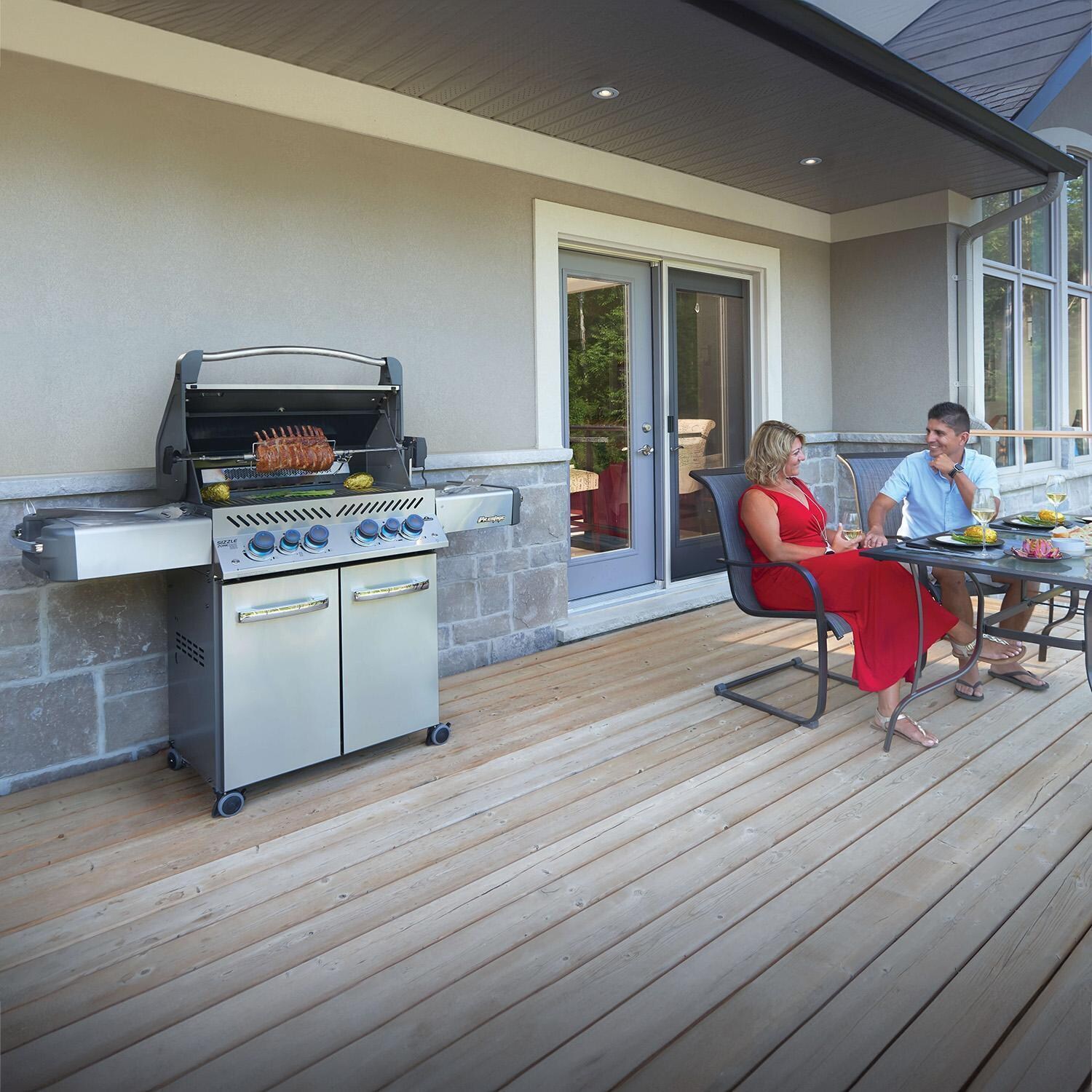 Napoleon Prestige 500 Propane Grill Bundle w/Cover, Charcoal Tray, Rotisserie Basket & Drip Trays - Prestige 500 Propane Gas Grill - On Patio - Lifestyle