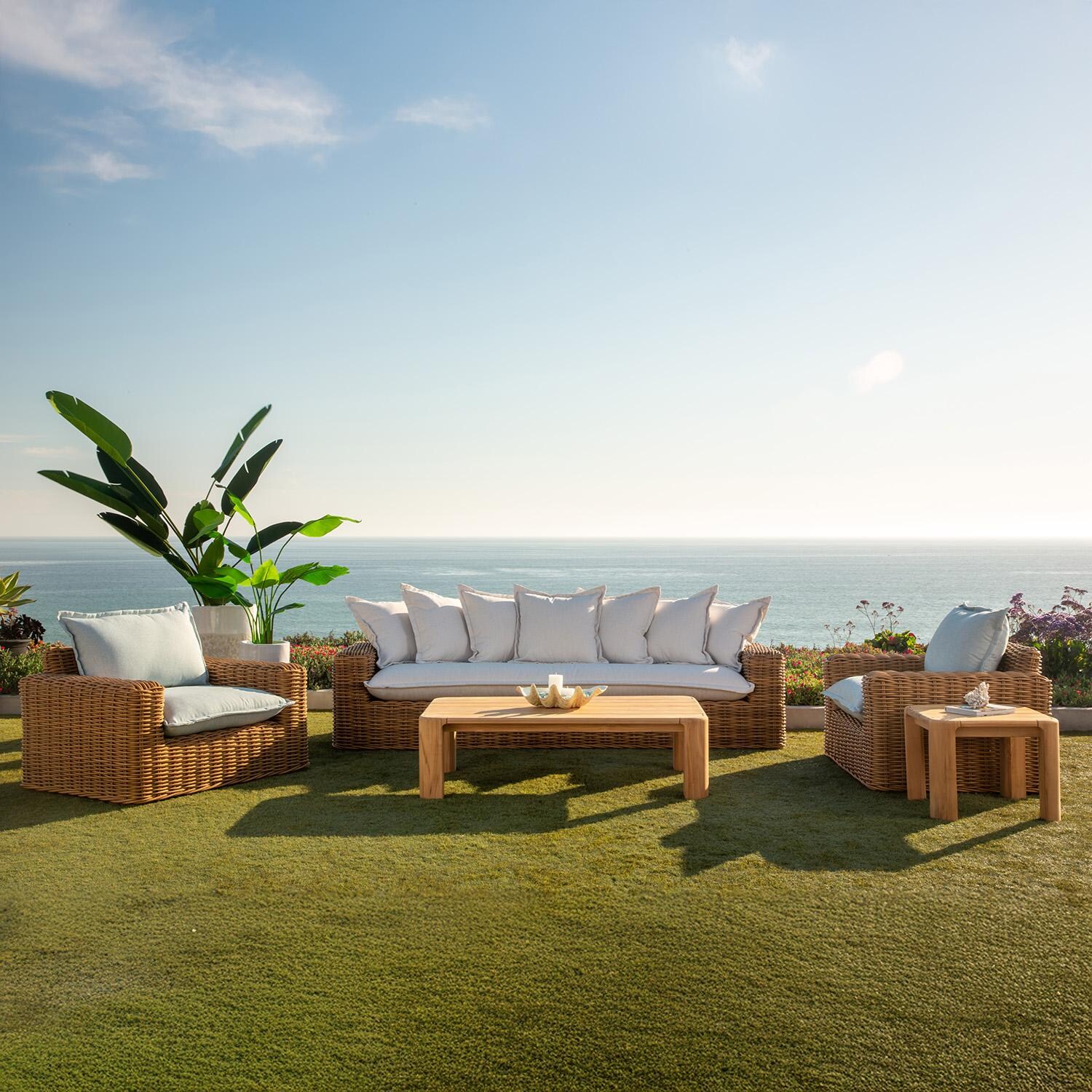 Playa Resin Wicker Oversized Swivel Club Chair in Medium Wood/Soothe Pearl by Sunset West - By Water (Shown as Set) - Lifestyle thumbnail