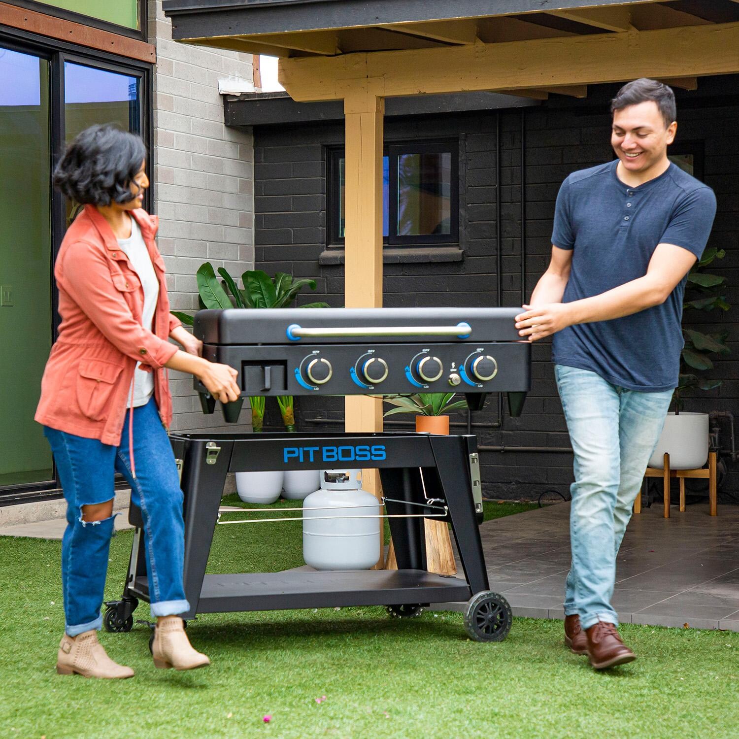 Pit Boss 10782 Ultimate Lift Off 4 Burner Propane Griddle - Removing from Cart - Lifestyle thumbnail