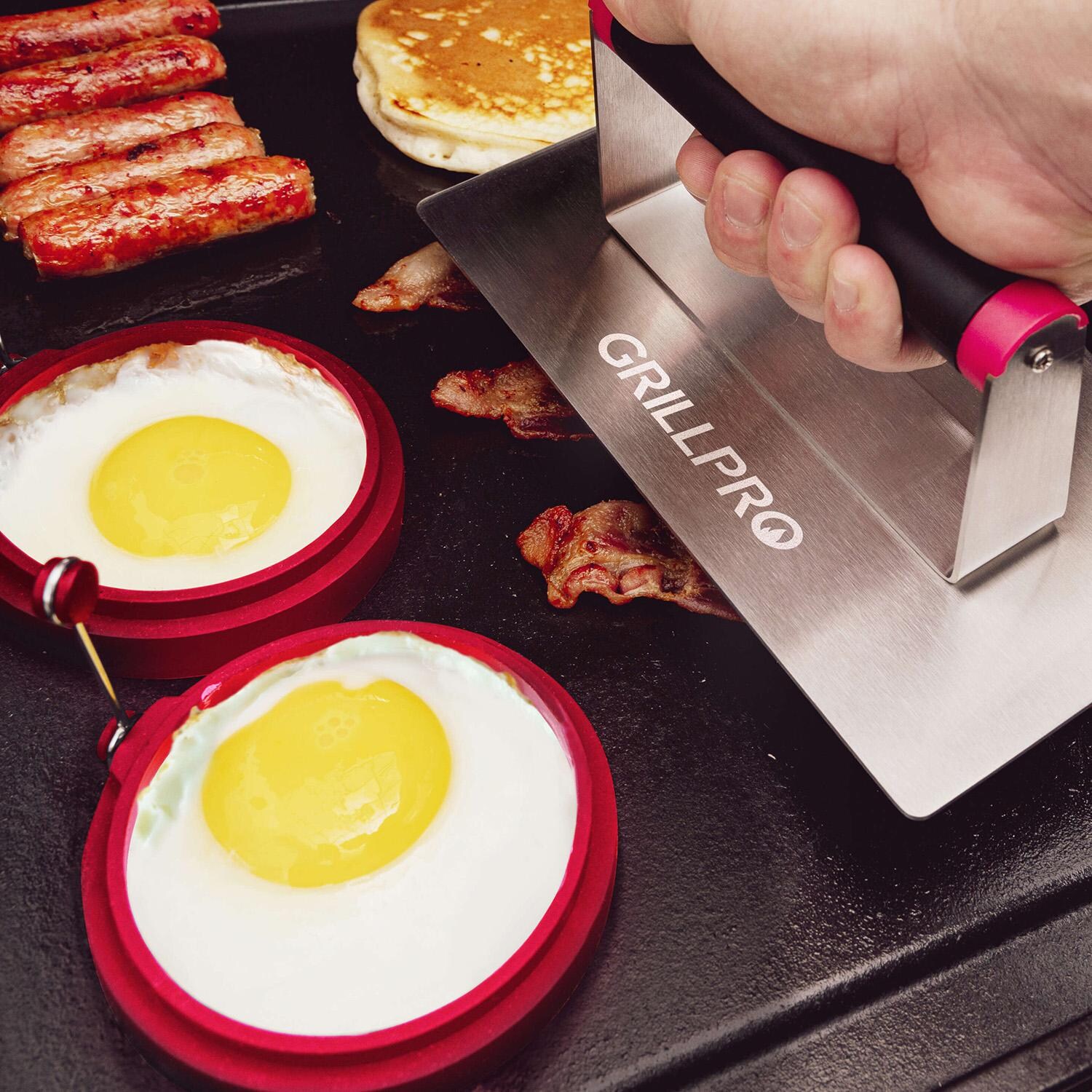 GrillPro Griddle Kit w/ Batter Dispenser, 2 Egg Rings & Stainless Steel Press - 91204 - Press & Rings In Use - Lifestyle thumbnail