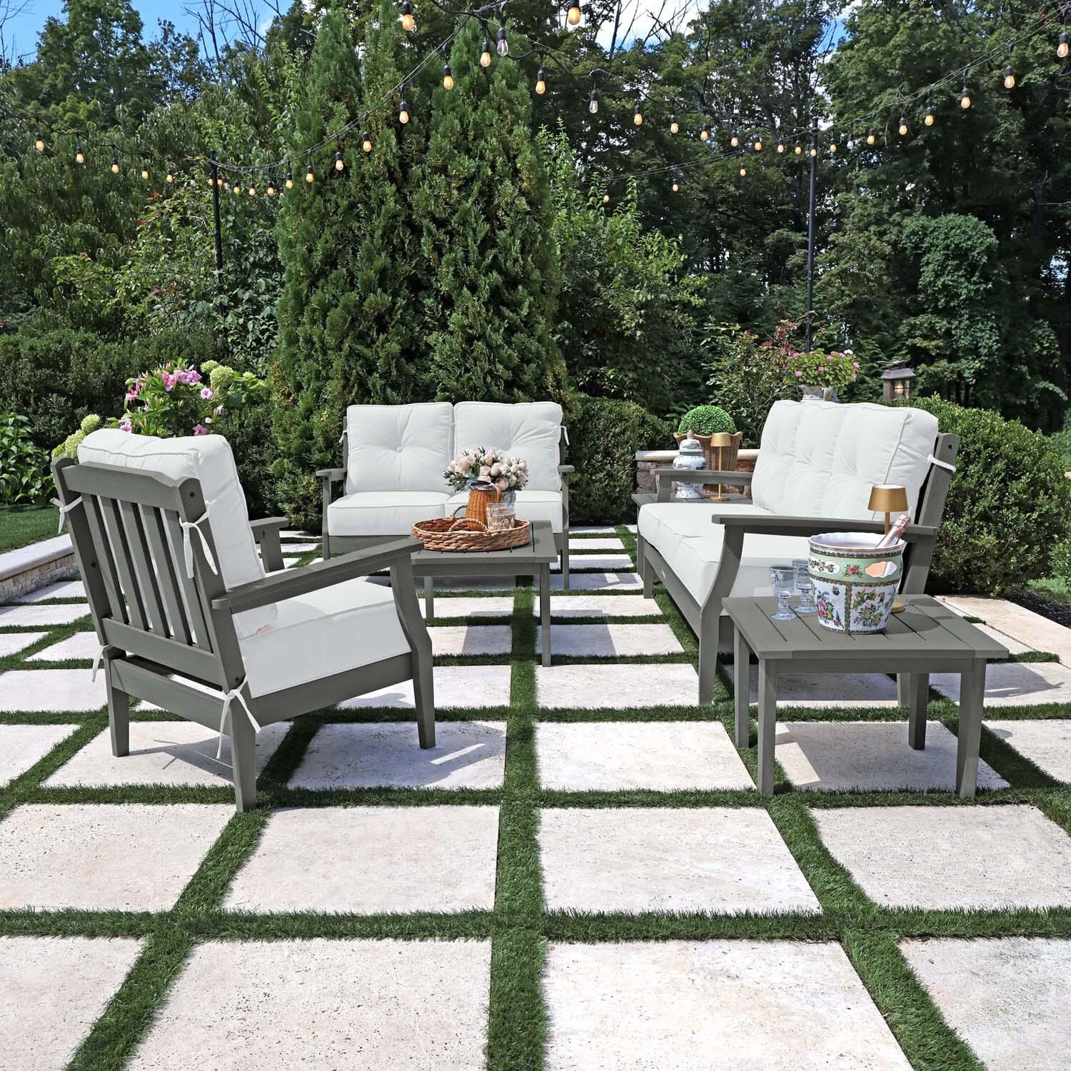 Blushing Bay 6 Pc Recycled Plastic Grand Seating Set in Bliss Linen/Coastal Teak by Lakeview Outdoor Designs - Side View - Lifestyle thumbnail