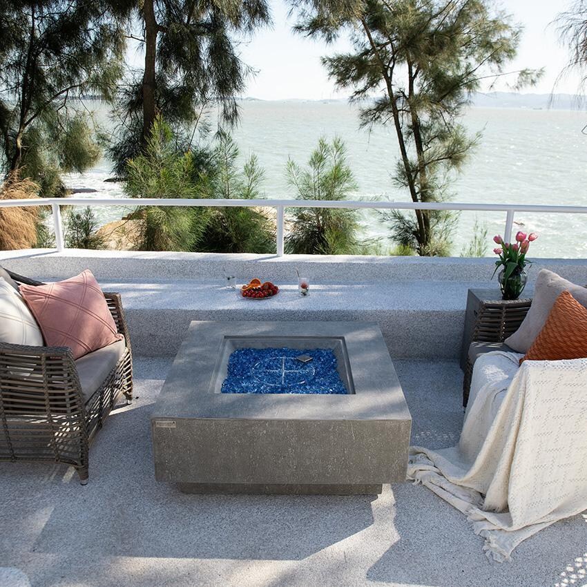 Victoria OFG413LG-LP 40 Inch Square Concrete Propane Fire Pit Table in Gray By Elementi - Off - Back Patio - Front View - Lifestyle thumbnail