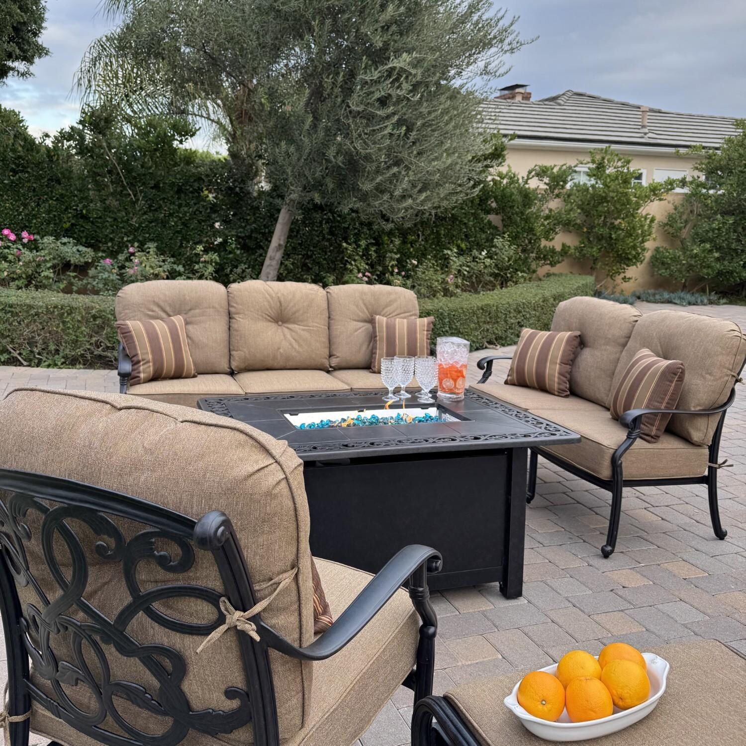 Santa Monica 4 Pc Cast Aluminum Seating Set w/ 49 X 35 Inch Fire Pit Table w/ Club Chair, Sofa, Loveseat, and Ottoman in Sesame/Antique Bronze by Darlee - Angled View - Lifestyle thumbnail
