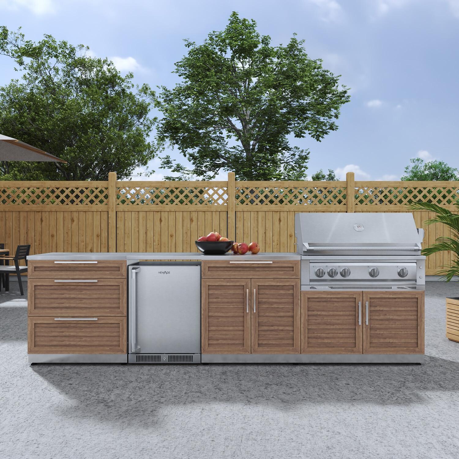 NewAge Products 67900 Classic Series 10 1/2 Ft Outdoor Kitchen Island w/ 40-in Propane Grill, Refrigerator, Trash Bin, Door & Drawer in Grove/Stainless Steel - On Patio - Lifestyle thumbnail