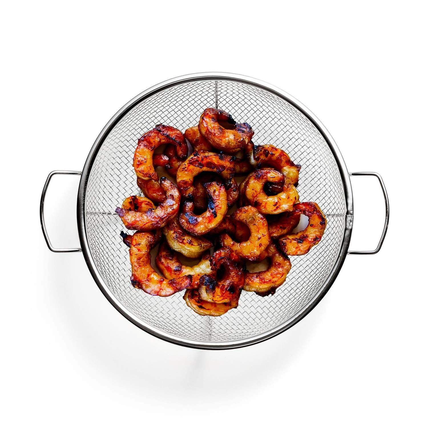 Outset  76518 SS Round Shallow Grill Basket - Shown w/ Shrimp - White Background thumbnail