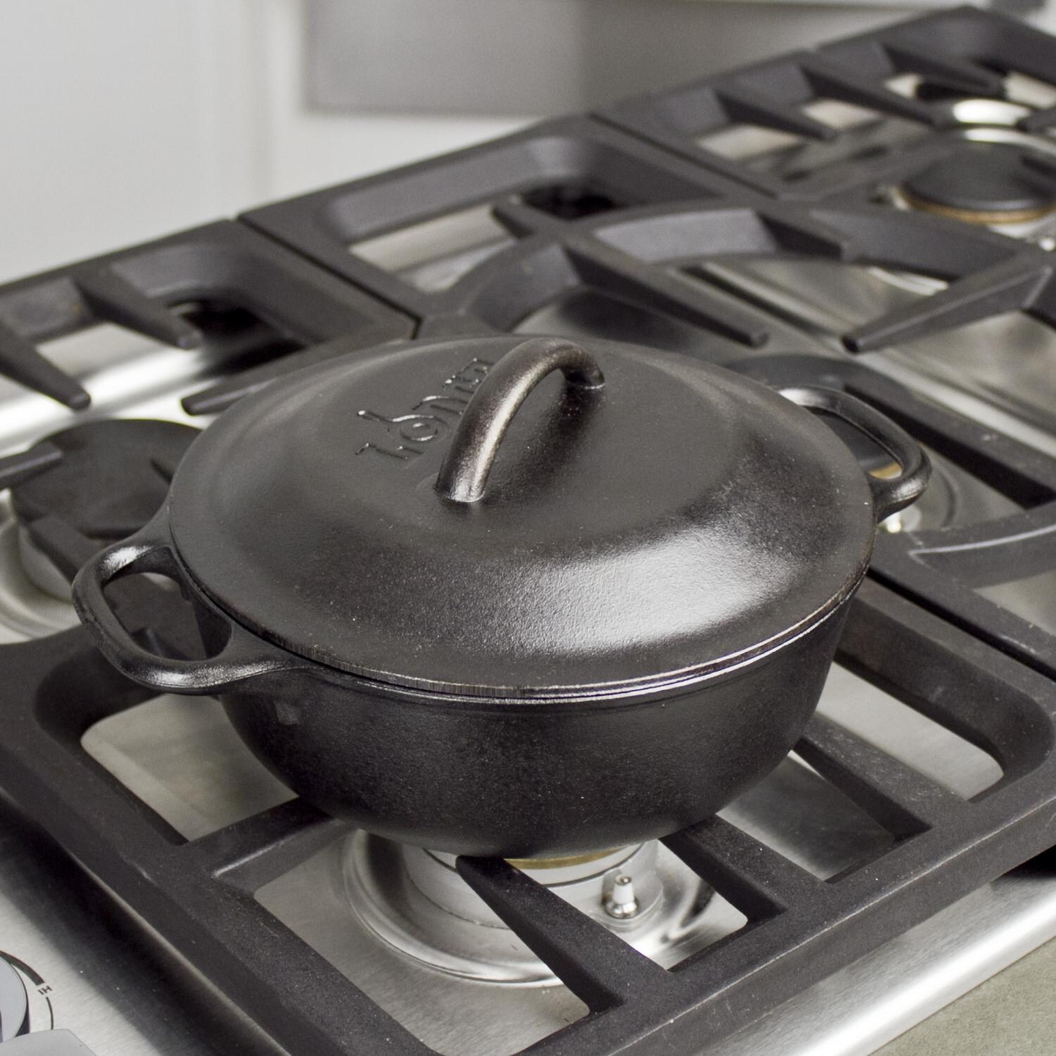 Lodge Seasoned Cast Iron Serving Pot With Iron Cover - In Use thumbnail