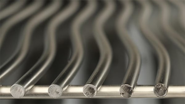 close-up of the stainless steel grates with patented wave design