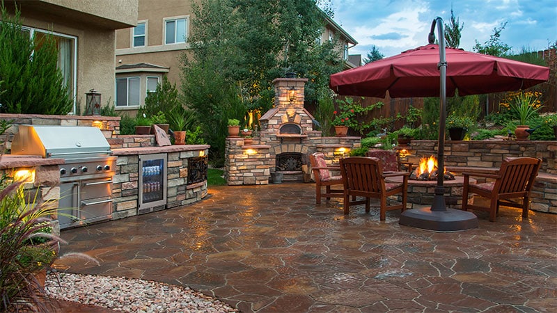 Large outdoor umbrella in outdoor kitchen patio
