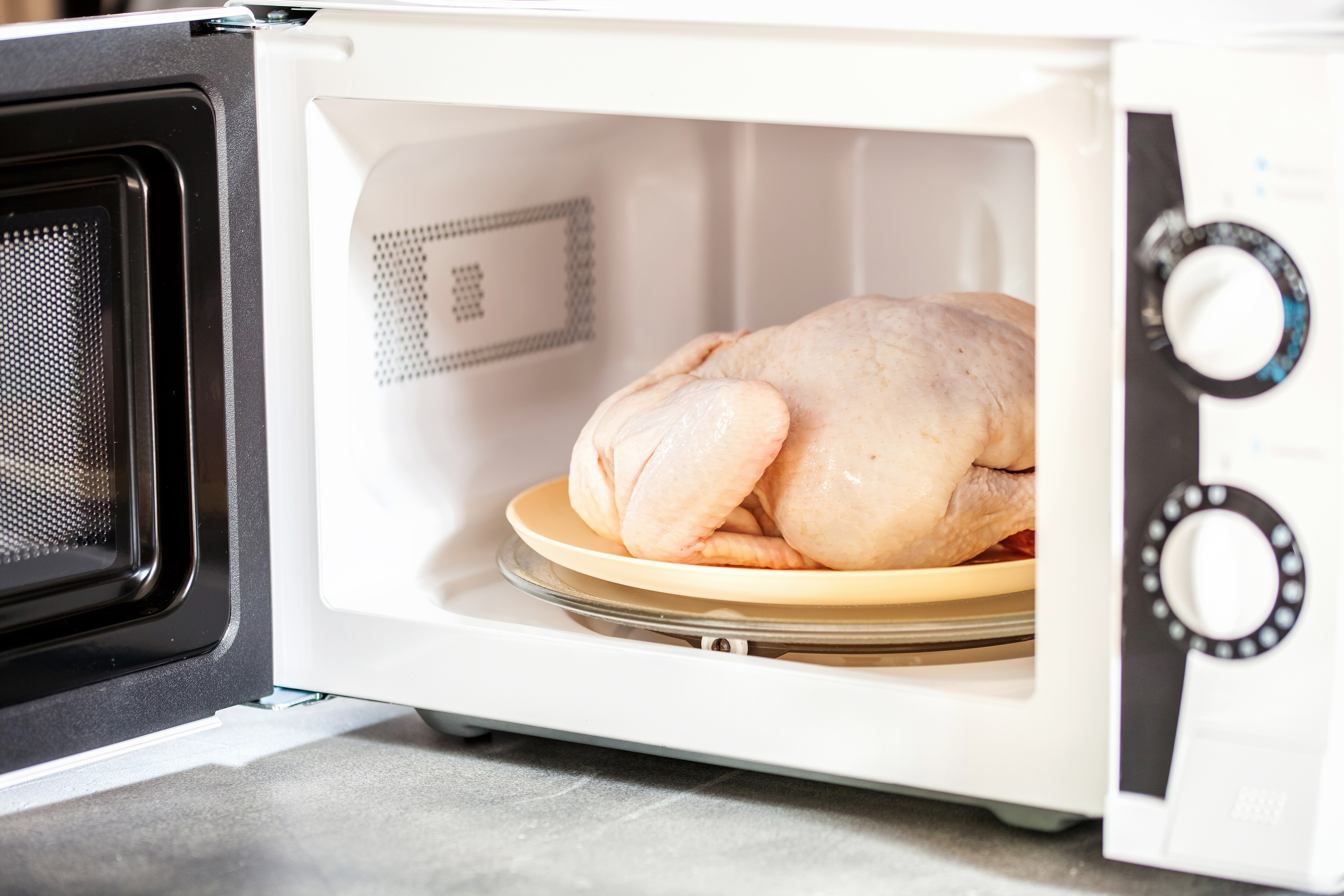Chicken thawing in microwave