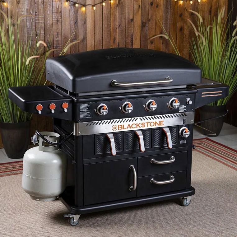 Blackstone griddle loaded with food