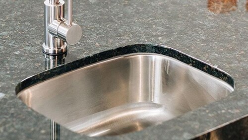 Outdoor sink installed in a counter