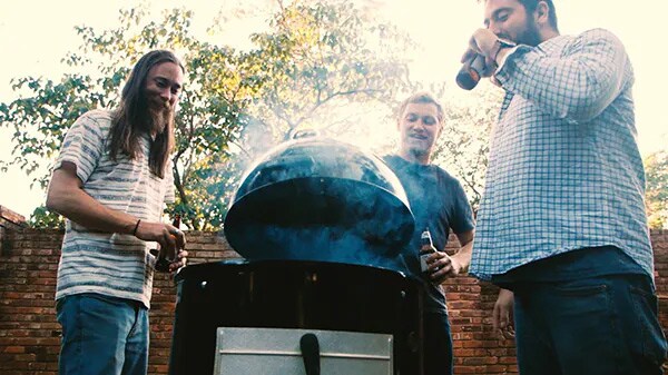 Guys around a smoker