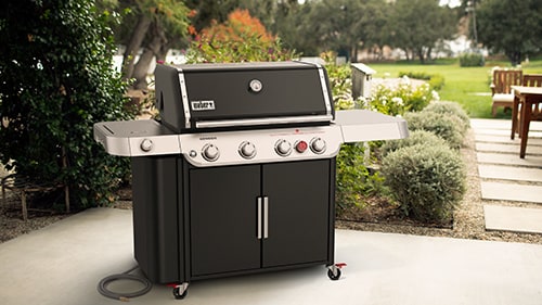 Weber Genesis S-435 with cart on a beautiful backyard patio