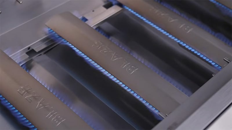 BCM Grill Head open with no grates, showing lit burners
