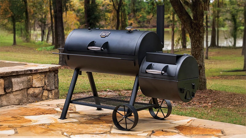 Oklahoma Joe Longhorn Reverse Flow Offset Smoker on a backyard patio