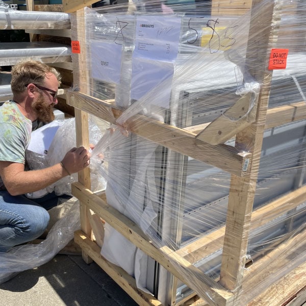contractor unboxing outdoor kitchen components