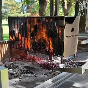 tagwood santa maria grill, firebox full of burning wood