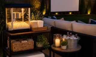 a snack station prepared for an outdoor movie night