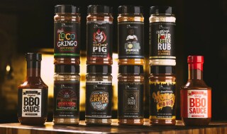 Assortment of small-batch and regional BBQ sauce bottles and rub containers