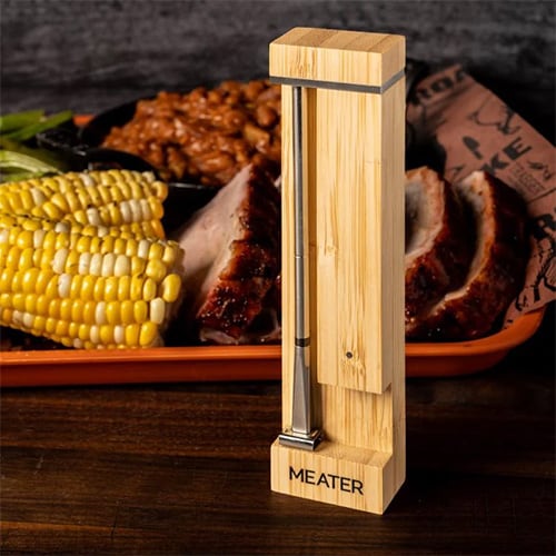 Meater pro thermometer in front of a plate of cooked food